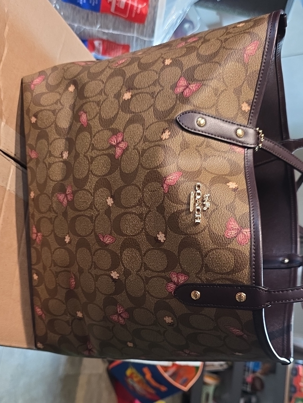 Coach Brown Signature Tote with Pink Butterfly Accents